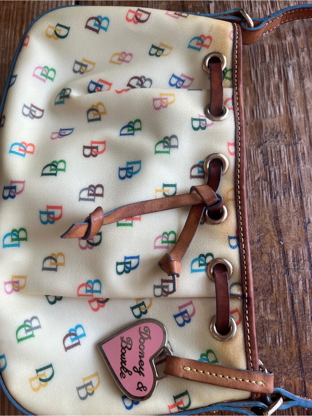Dooney & Bourke Cream Multicolor DB Logo Drawstring Shoulder Bag - Picture 9 of 11